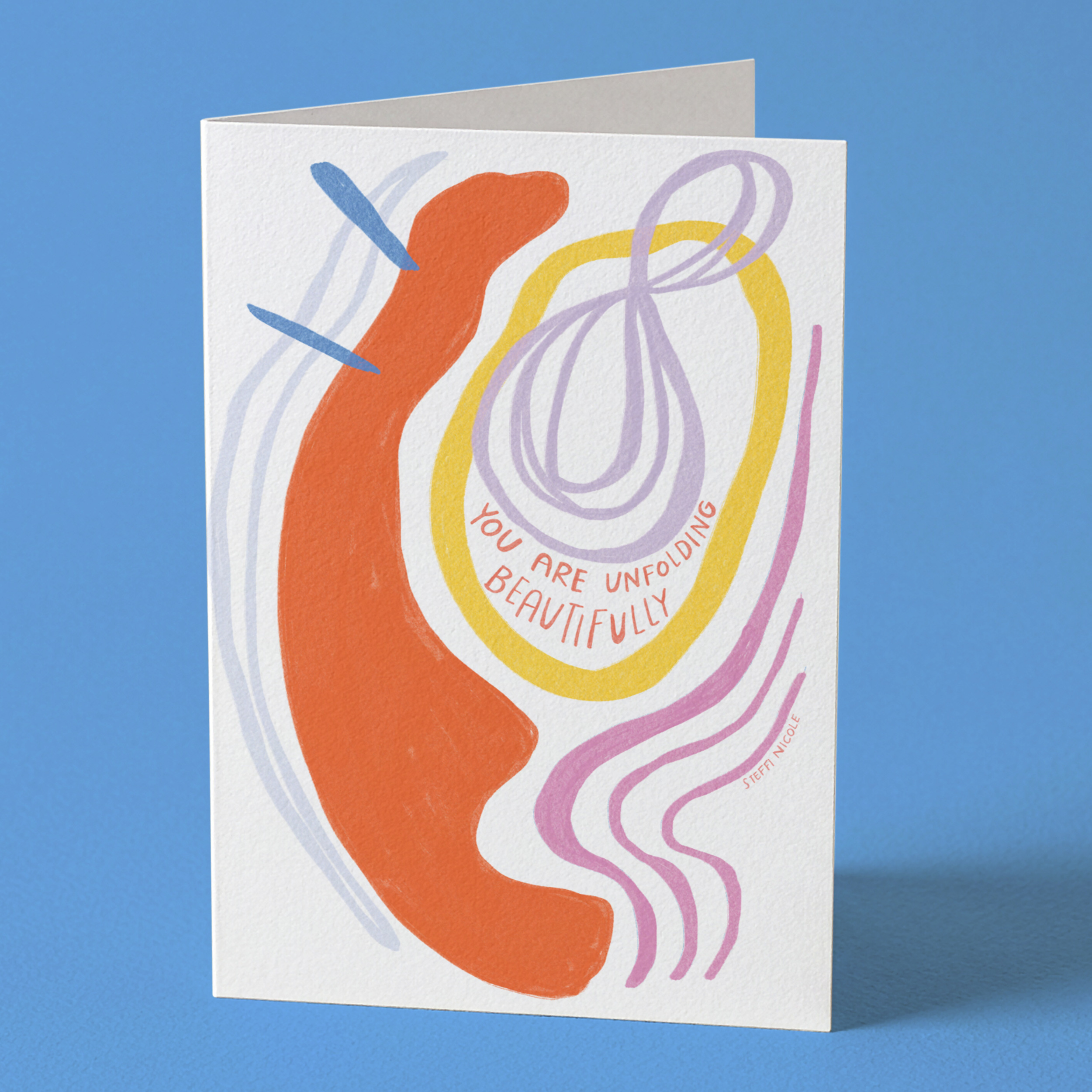Greeting card with abstract design and text on a blue background